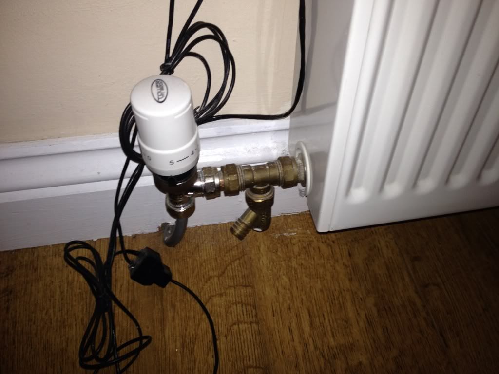 Living room radiator warm at top, cold at bottom not air Page 1